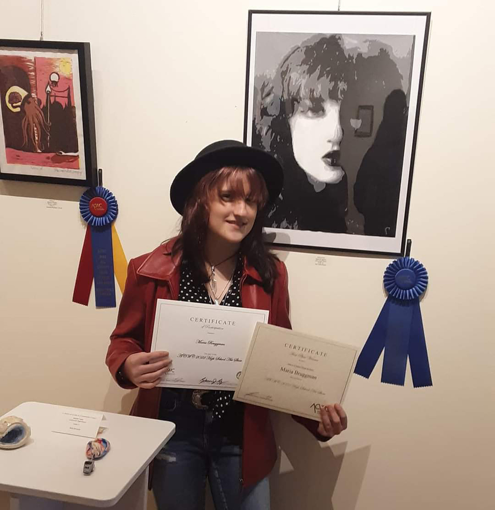 Student Maria Bruggman with her first-place submission. 