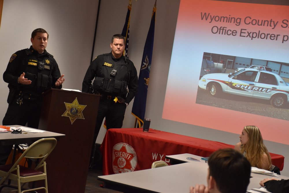 Wyoming County Sheriff’s deputies Nick Wright, left, and Sam West, who also serves as the school resource officer at Attica Central School District, lead a meeting of the Wyoming County Sheriff’s Office’s Explorer Post at the end of November. 