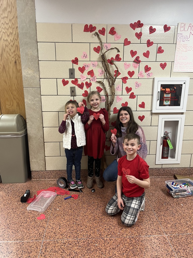 Some of our elementary schoolers gave junior Alana Pellicane a hand yesterday as she set about making a kindness tree in the high school main lobby. 
