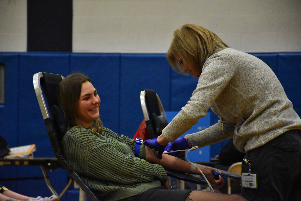 An Attica student is pictured giving blood at the ConnectLife blood drive Wednesday in the auxiliary gym. 