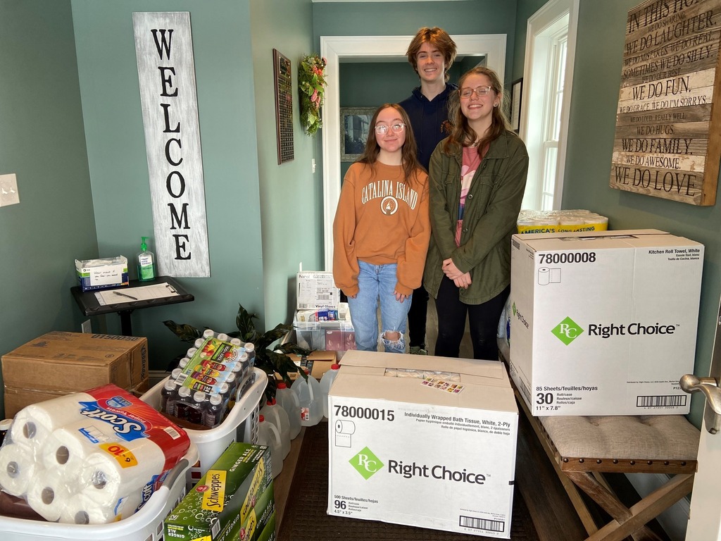 Lillian Gromek, Nolan Rzepka and Bryne Wolcott are pictured dropping off some of the donated items they collected at Gateway Home March 13. 