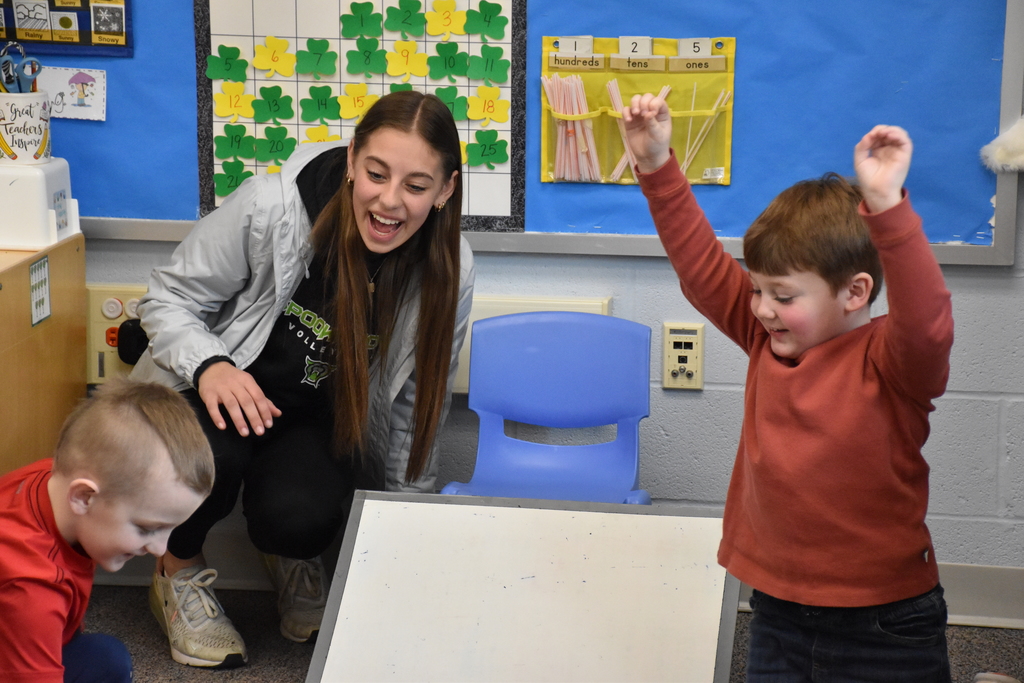 Elementary and high school students are pictured doing a STEM activity Tuesday morning at Attica Elementary School.