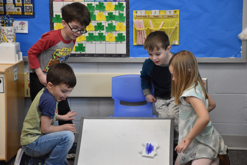 Elementary and high school students are pictured doing a STEM activity Tuesday morning at Attica Elementary School. 