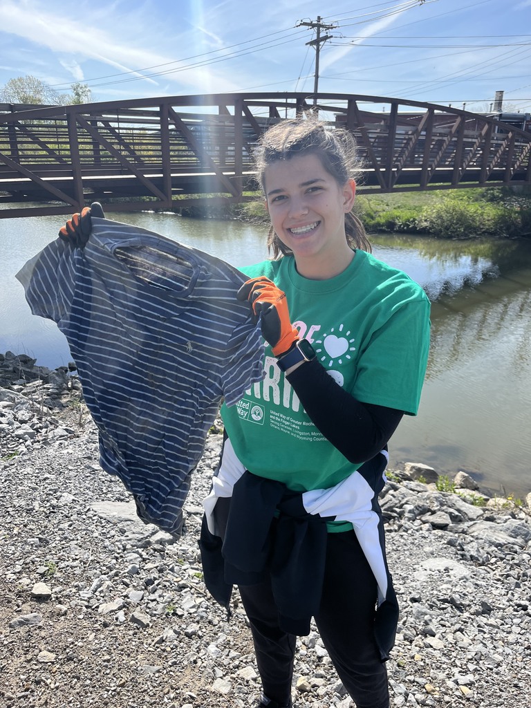 Attica students are pictured cleaning up the Ellicott Trail in Batavia Thursday during United Way of Greater Rochester and the Finger Lakes’ annual Day of Caring. 