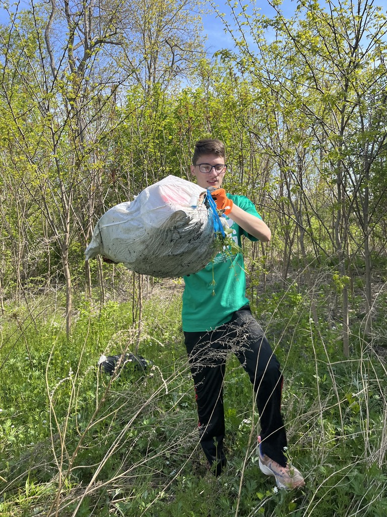 Attica students are pictured cleaning up the Ellicott Trail in Batavia Thursday during United Way of Greater Rochester and the Finger Lakes’ annual Day of Caring. 