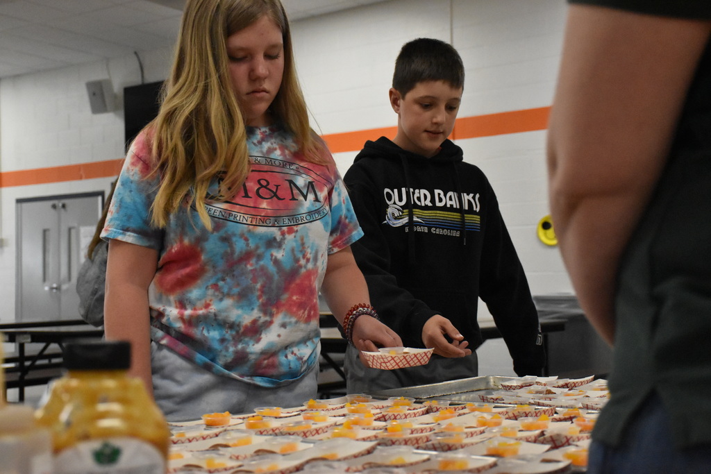 Students are pictured Friday during the Merle Maple taste testing. 