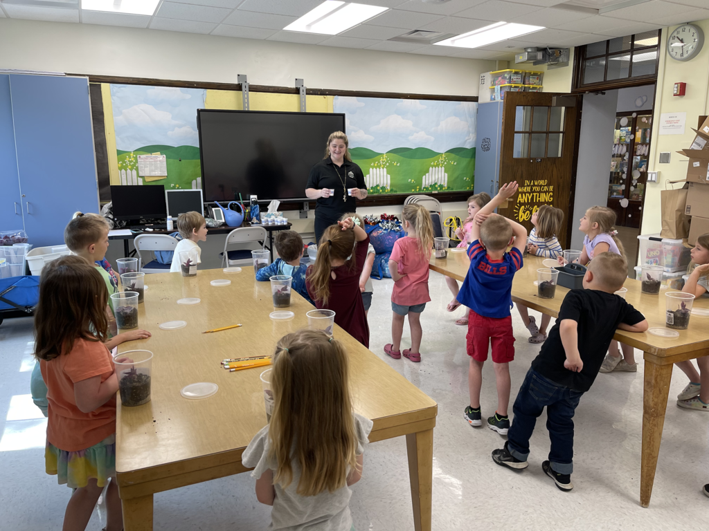 Pre-kindergarteners are pictured last week during a learning activity with a representative of the Buffalo Botanical Garden. 