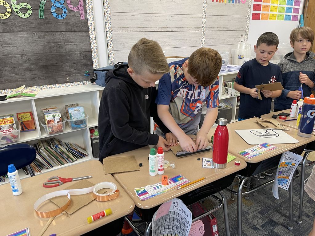 Attica fourth graders are pictured last week creating simple electrical circuits using Makey Makey invention kits. 