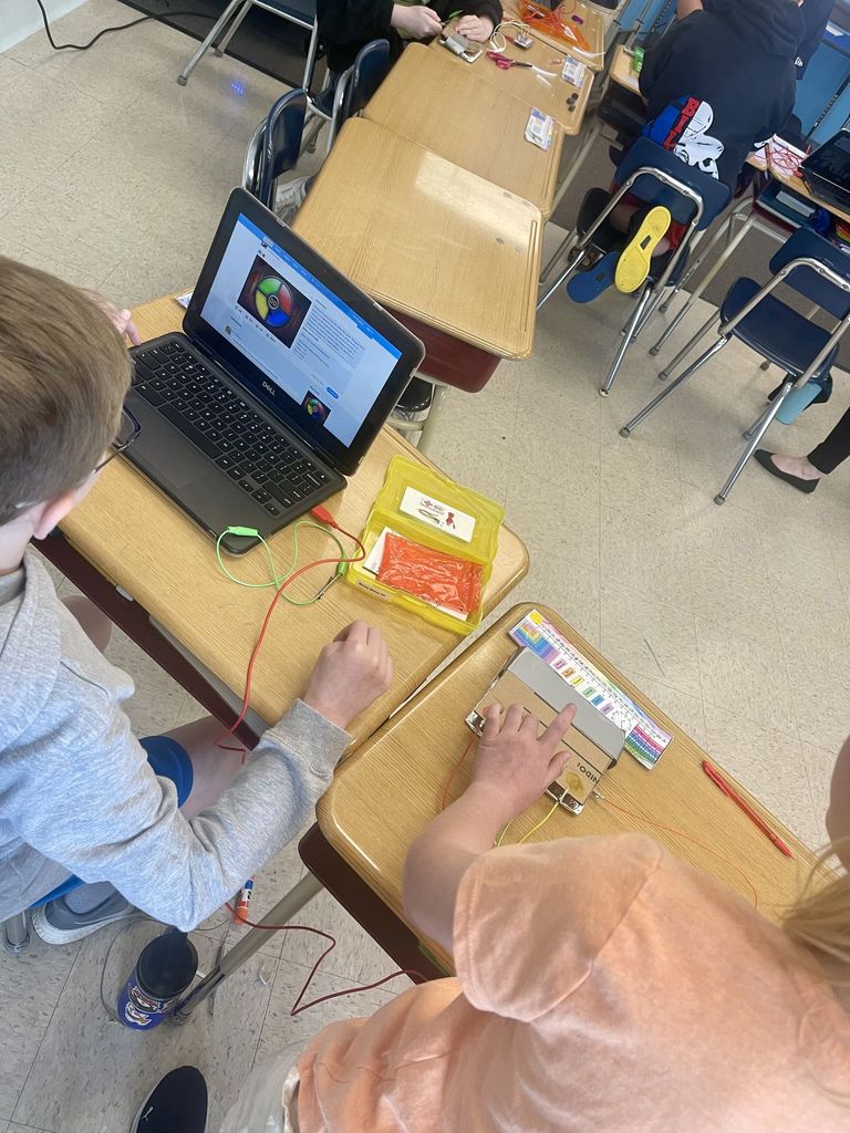 Attica fourth graders are pictured last week creating simple electrical circuits using Makey Makey invention kits.