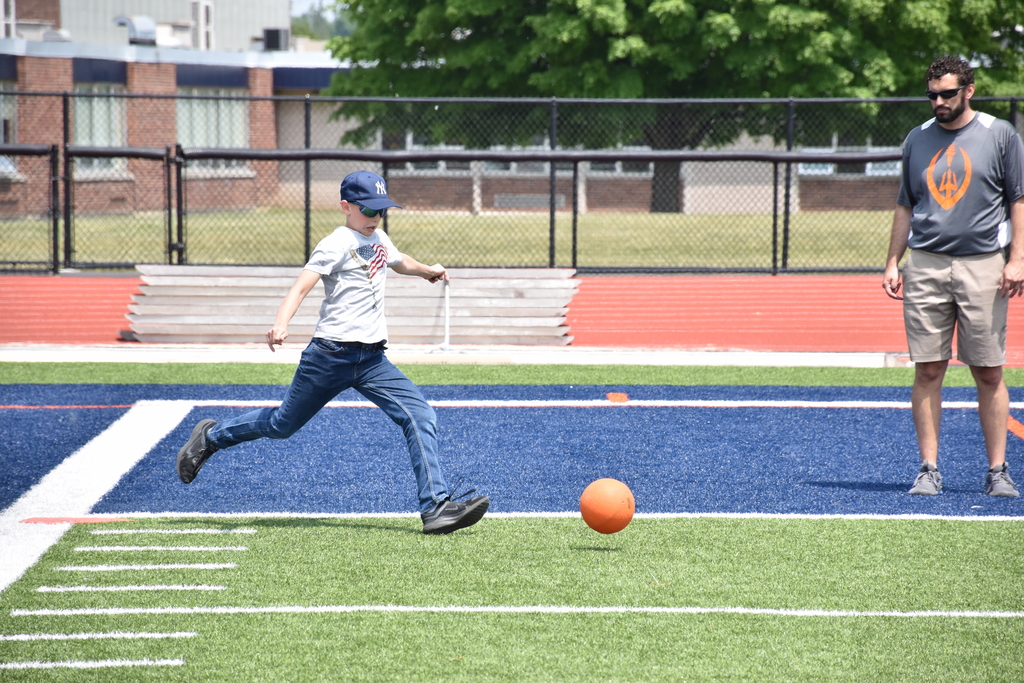 Bryton Scripp is pictured playing kickball in gym class last week. 
